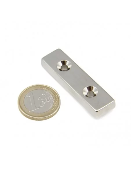Bloque avellanado de neodimio 50 × 13 × 6 (⌀4) mm N52 cara Norte (2 taladros) Bloque avellanado de neodimio 50 × 13 × 6 (⌀4) mm N52 cara Norte (2 taladros)