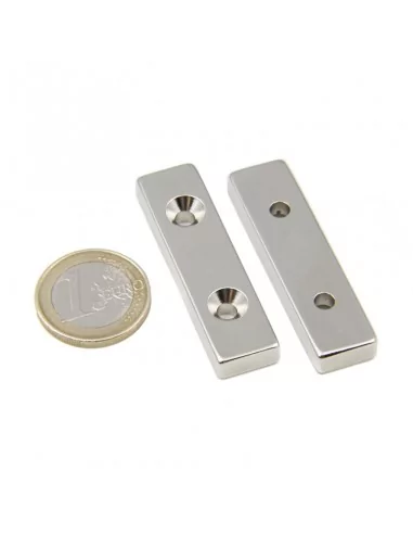 Bloque avellanado de neodimio 50 × 13 × 6 (⌀4) mm N52 cara Norte (2 taladros) Bloque avellanado de neodimio 50 × 13 × 6 (⌀4) mm N52 cara Norte (2 taladros)