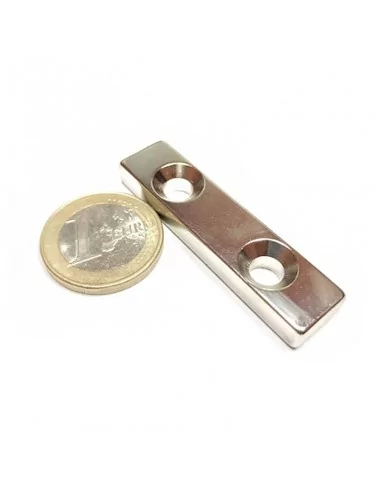 Bloque avellanado de neodimio 50 × 13 × 6 (⌀4) mm N52 cara Sur (2 taladros) Bloque avellanado de neodimio 50 × 13 × 6 (⌀4) mm N52 cara Sur (2 taladros)